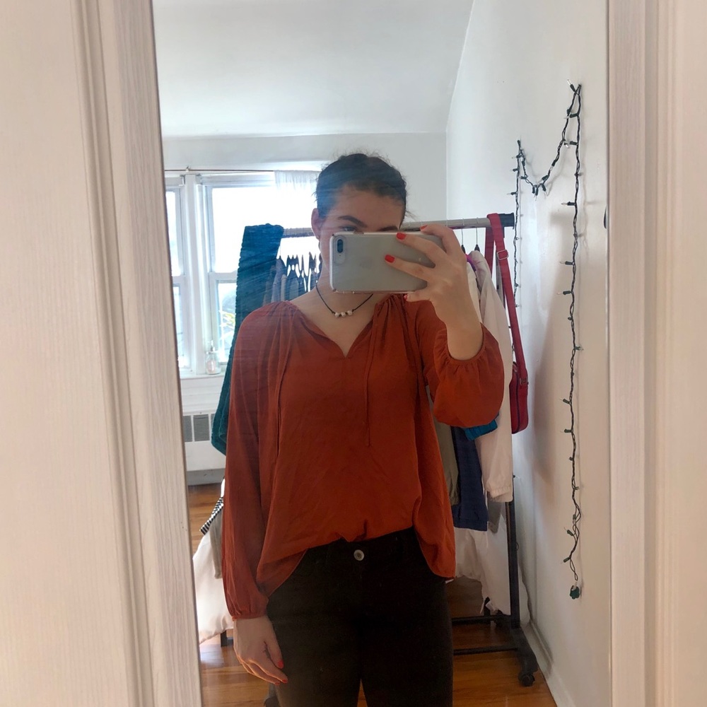 Burnt orange blouse with cinched sleeves
